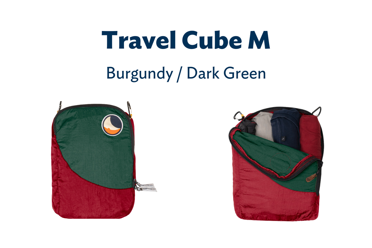 Travel Cube Medium (Custom) in Burgundy and Dark Green, shown closed and unzipped with rolled clothes inside
