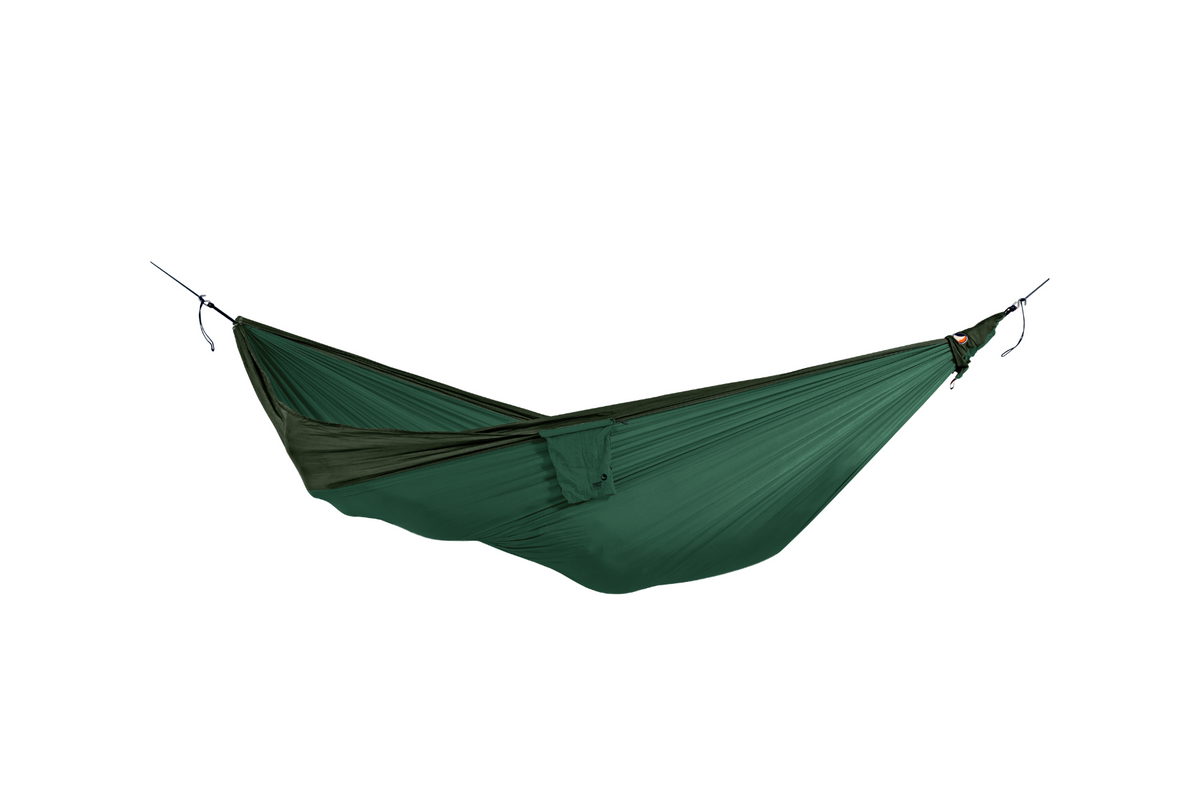 Travel Hammock Original in Dark Green and Army Green, hung empty with its stuff sack attached, side view