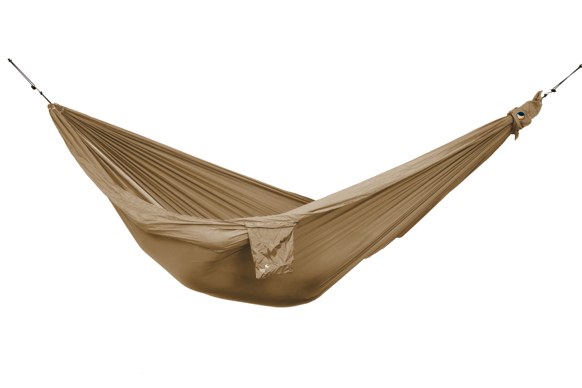 Travel Hammock King Size in sand brown, hung empty with its stuff sack attached, side view
