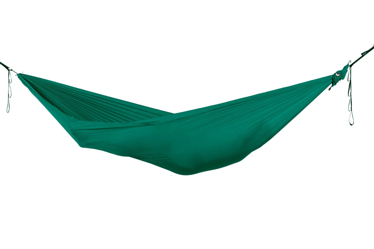 Lightest Hammock in emerald green, hung empty with whoopie slings, side view