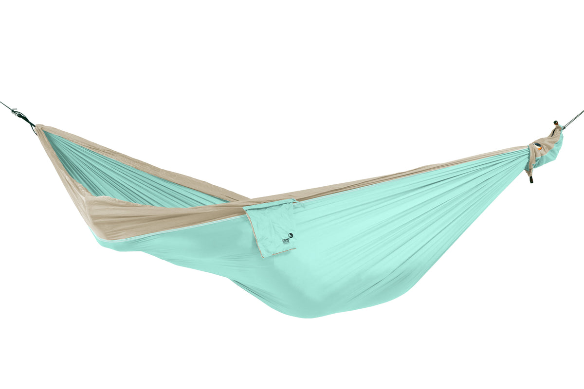 Travel Hammock Original in mint and sand, hung empty, side view