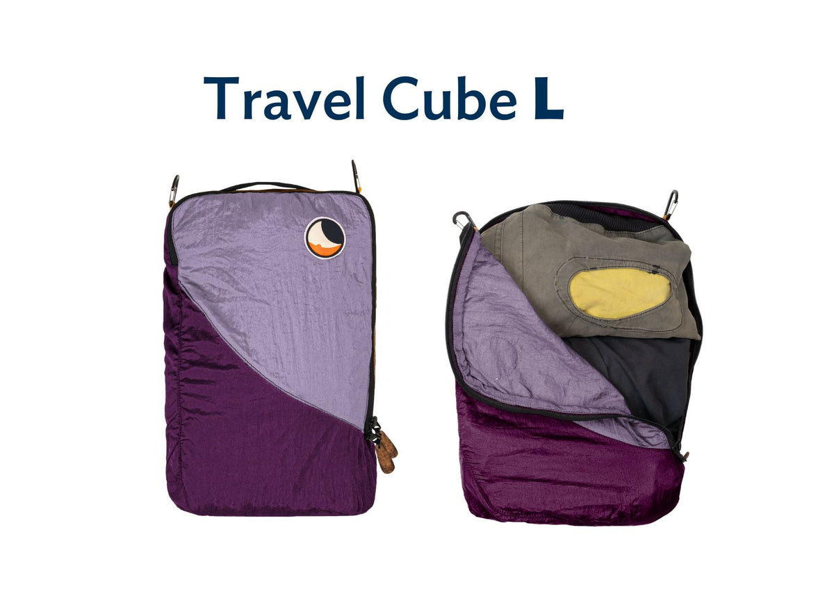 Travel Cube Large in purple and lilac, shown closed and open with a jacket packed inside