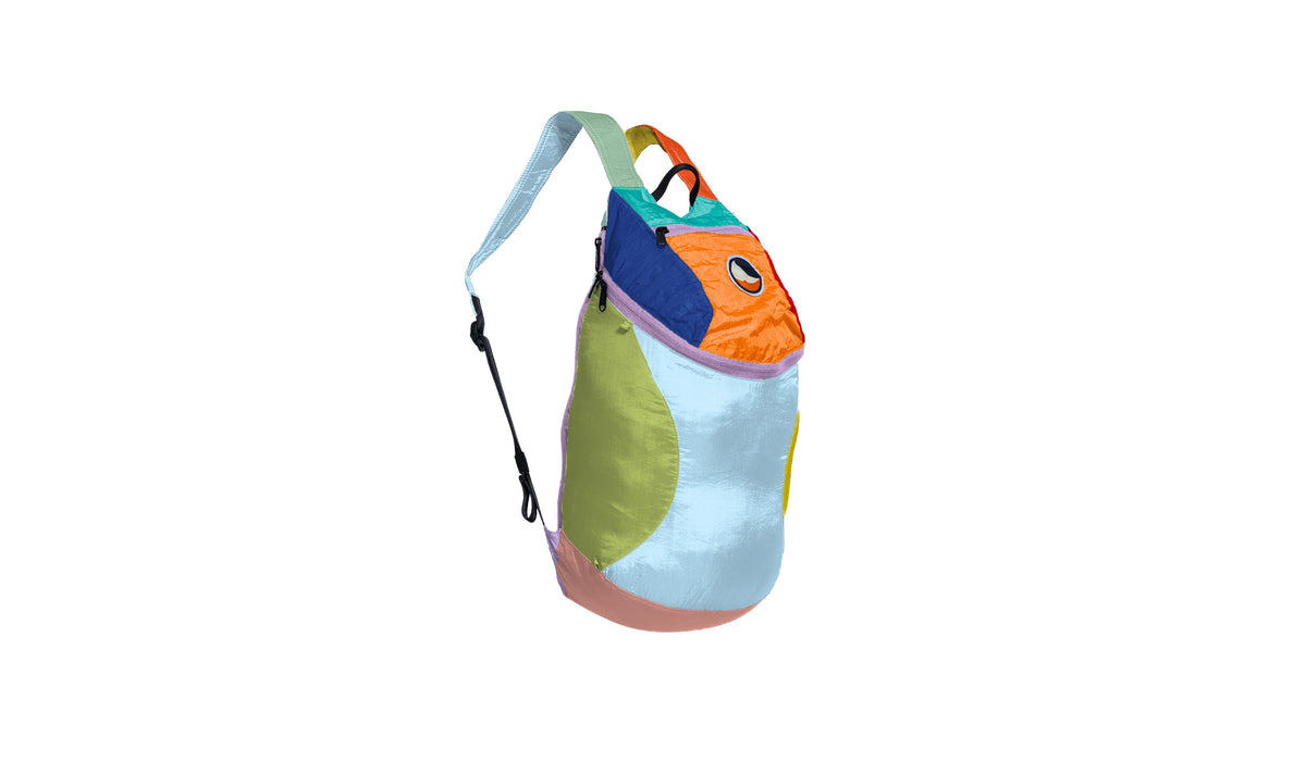 Backpack XS in Unique multicoloured patchwork, side view with shoulder strap