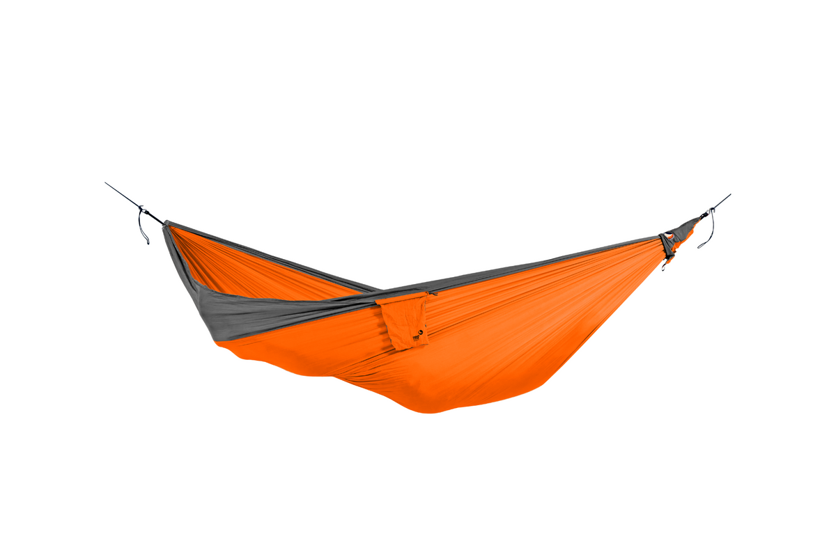 Travel Hammock Original in orange and grey, hung empty with its stuff sack attached, side view