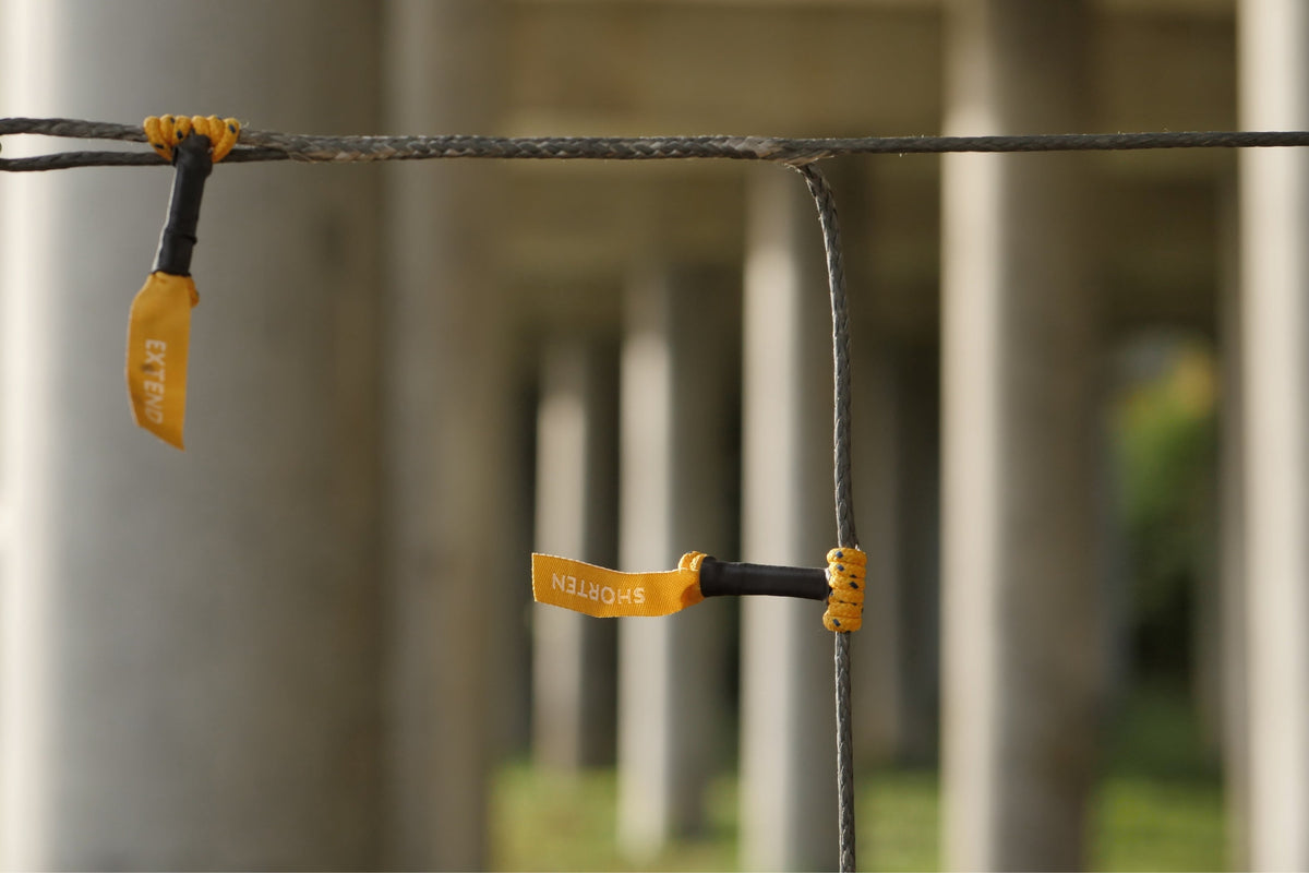 Close-up of Ridgeline cord with yellow Extend and Shorten pull tabs