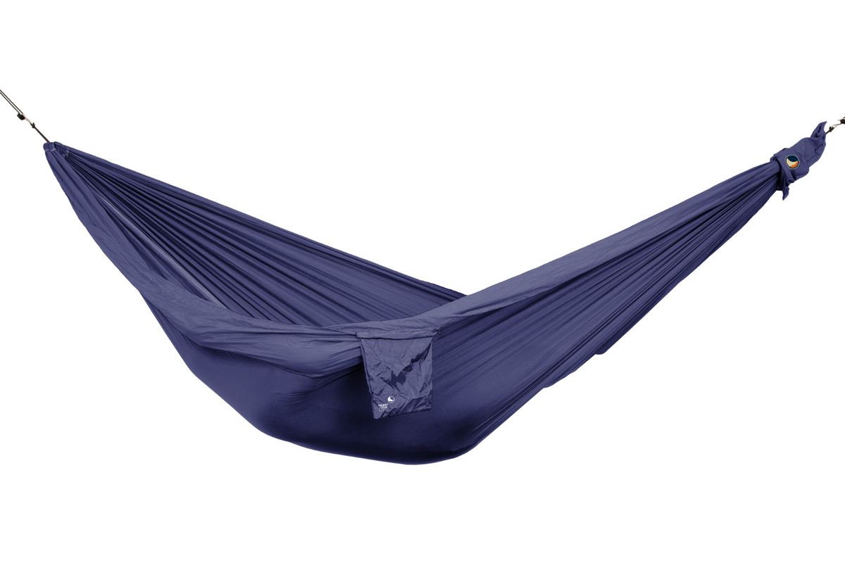 Travel Hammock King Size in navy blue, hung empty with its stuff sack attached, side view