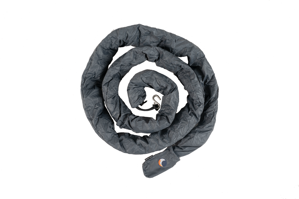 UV-Proof Hammock Sleeve in dark grey, coiled flat with its hook and moon logo end visible