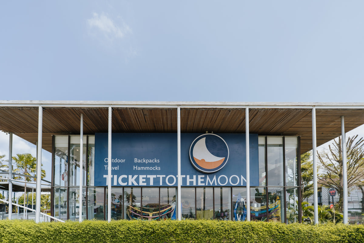 Ticket To The Moon store with glass walls under a slatted roof. Outdoor, Travel, Backpacks, Hammocks