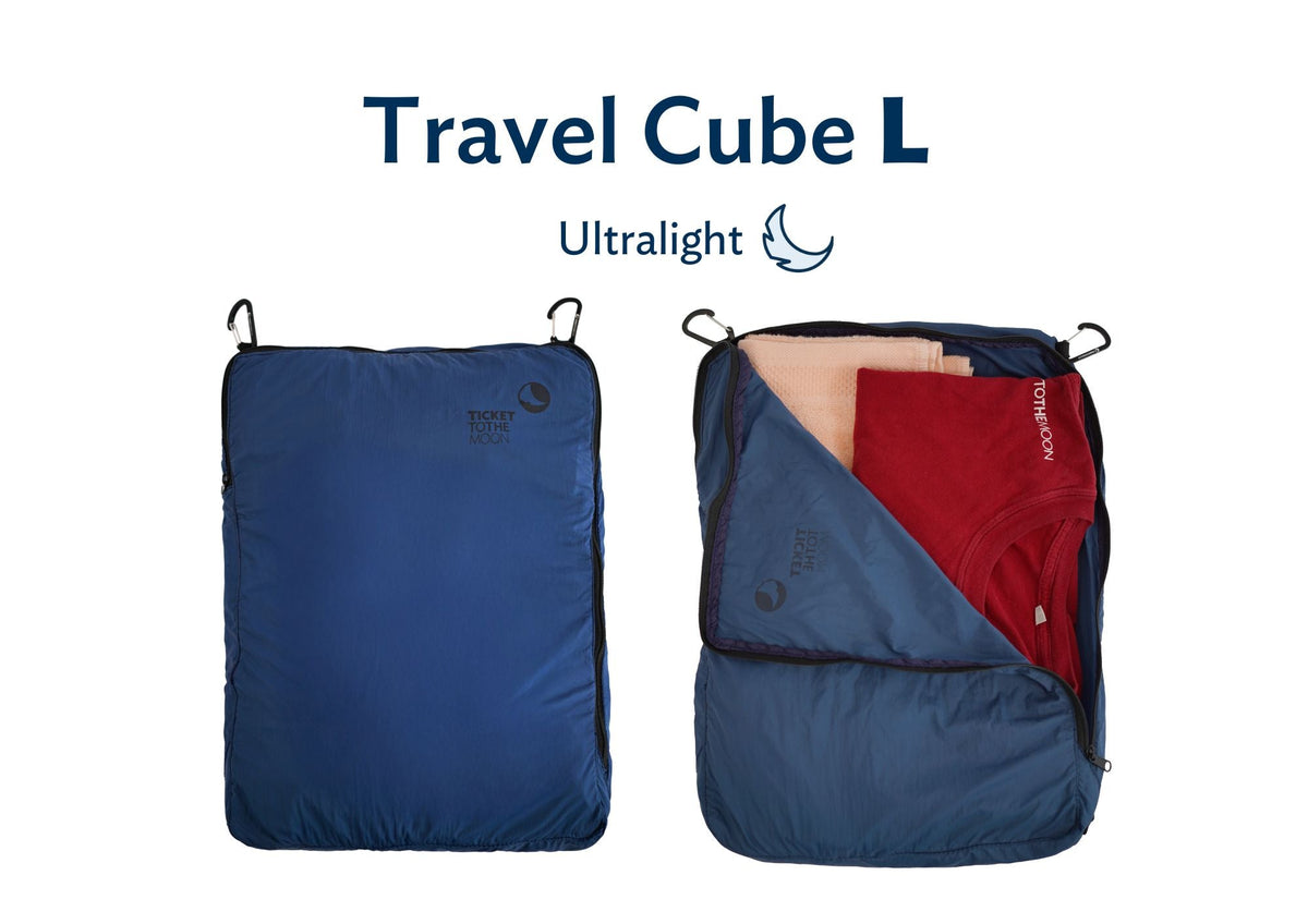 Travel Cube Large, Ultralight version in navy blue, shown closed and open with folded clothes inside