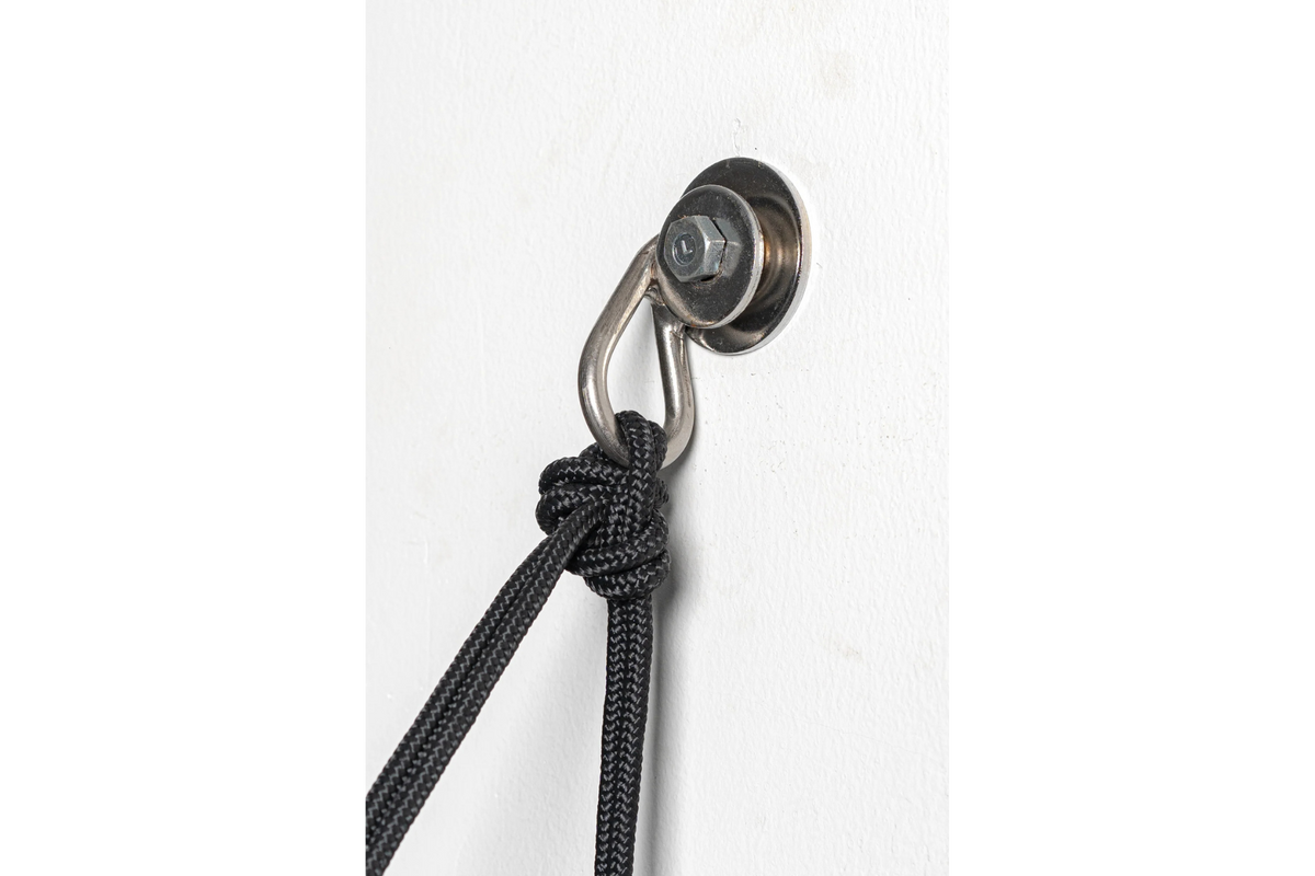 Anchor Kit Set wall anchor fitted to a white wall with a black rope knotted through it