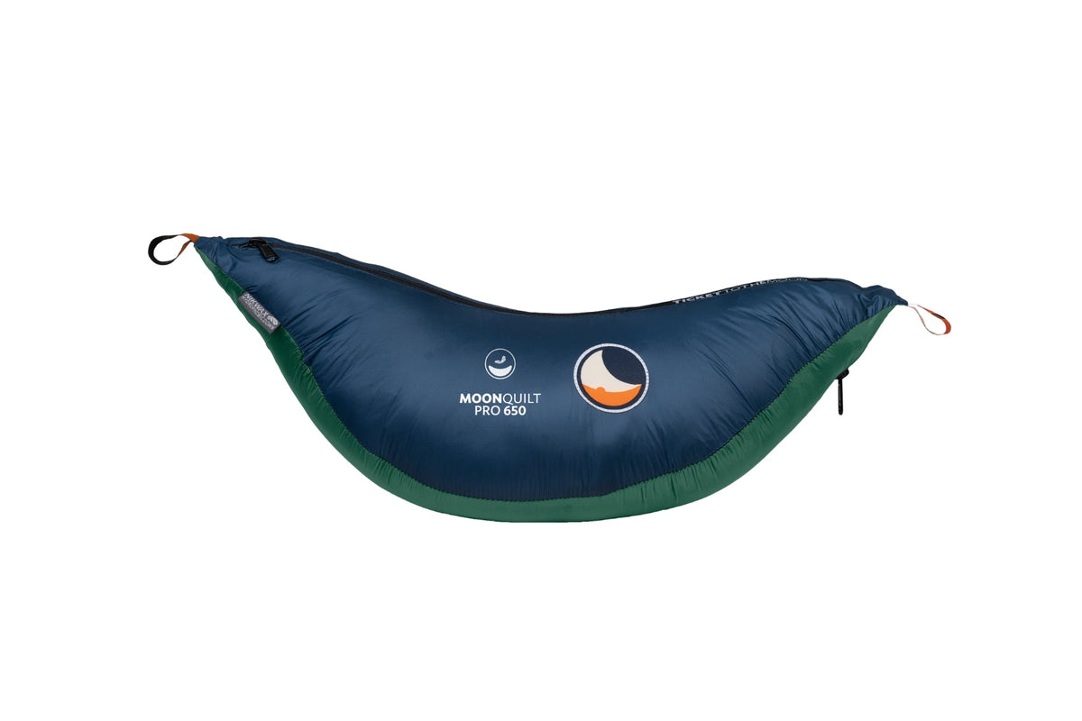 Moonquilt Pro 650 in navy blue and green, shaped like a hammock underquilt, with Moonquilt Pro 650 print