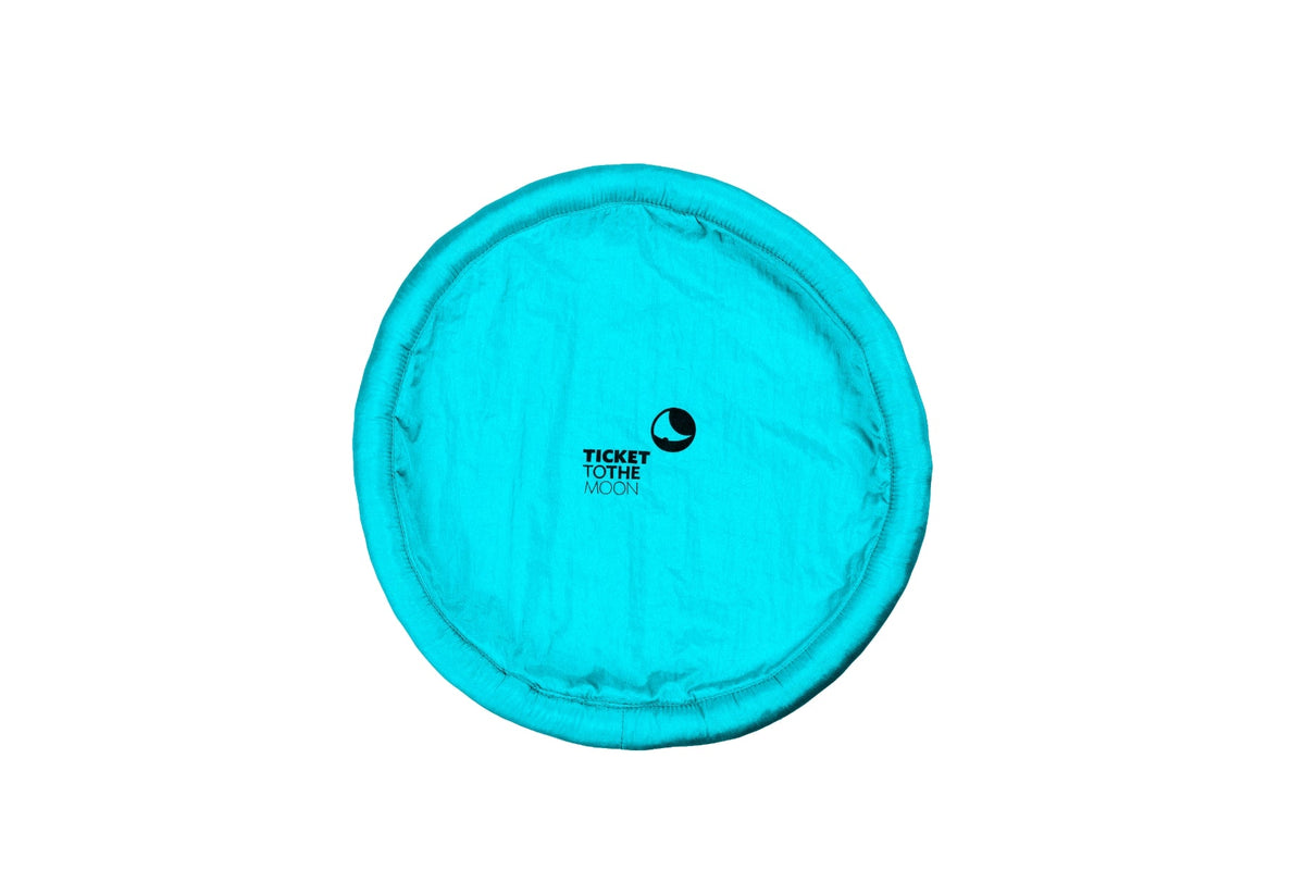 Moon Disc (Pocket) in turquoise, flat top view showing the logo